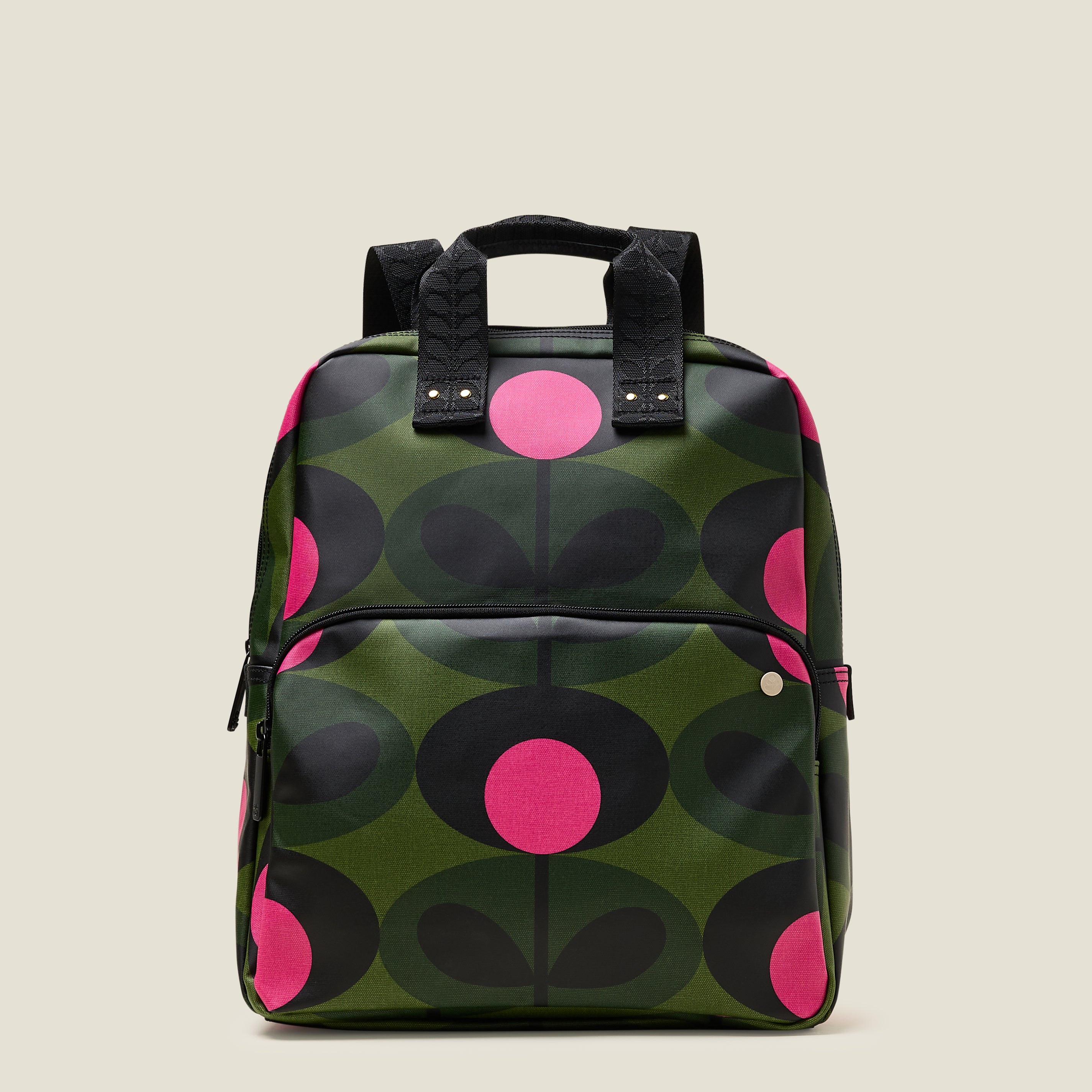Front view of  the Lotta Backpack in a green stem print with bright pink dots, featuring a zipped front pocket branded grab handles.