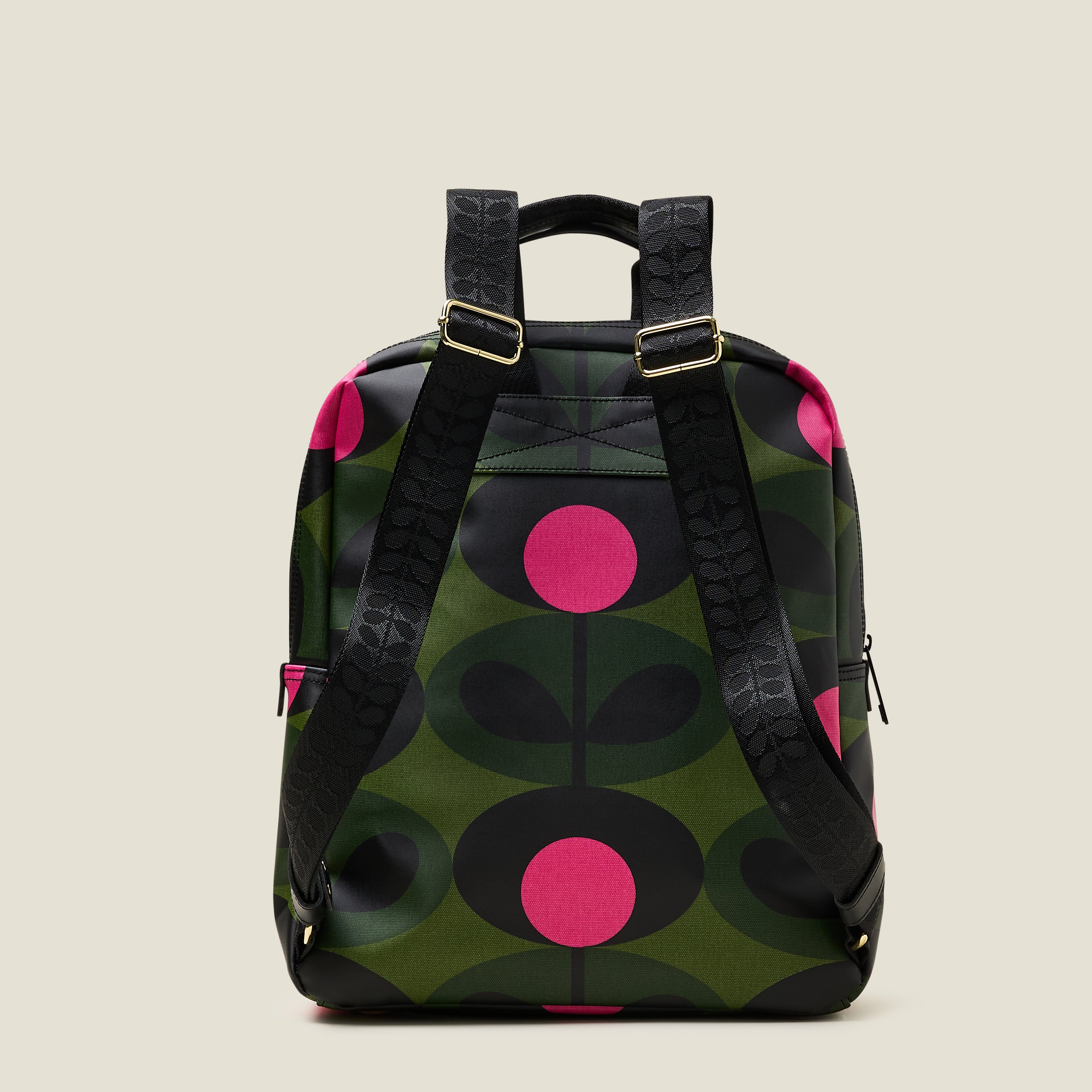 Back  view of  the Lotta Backpack in a green stem print with bright pink dots, featuring branded grab handles and adjustable shoulder straps.