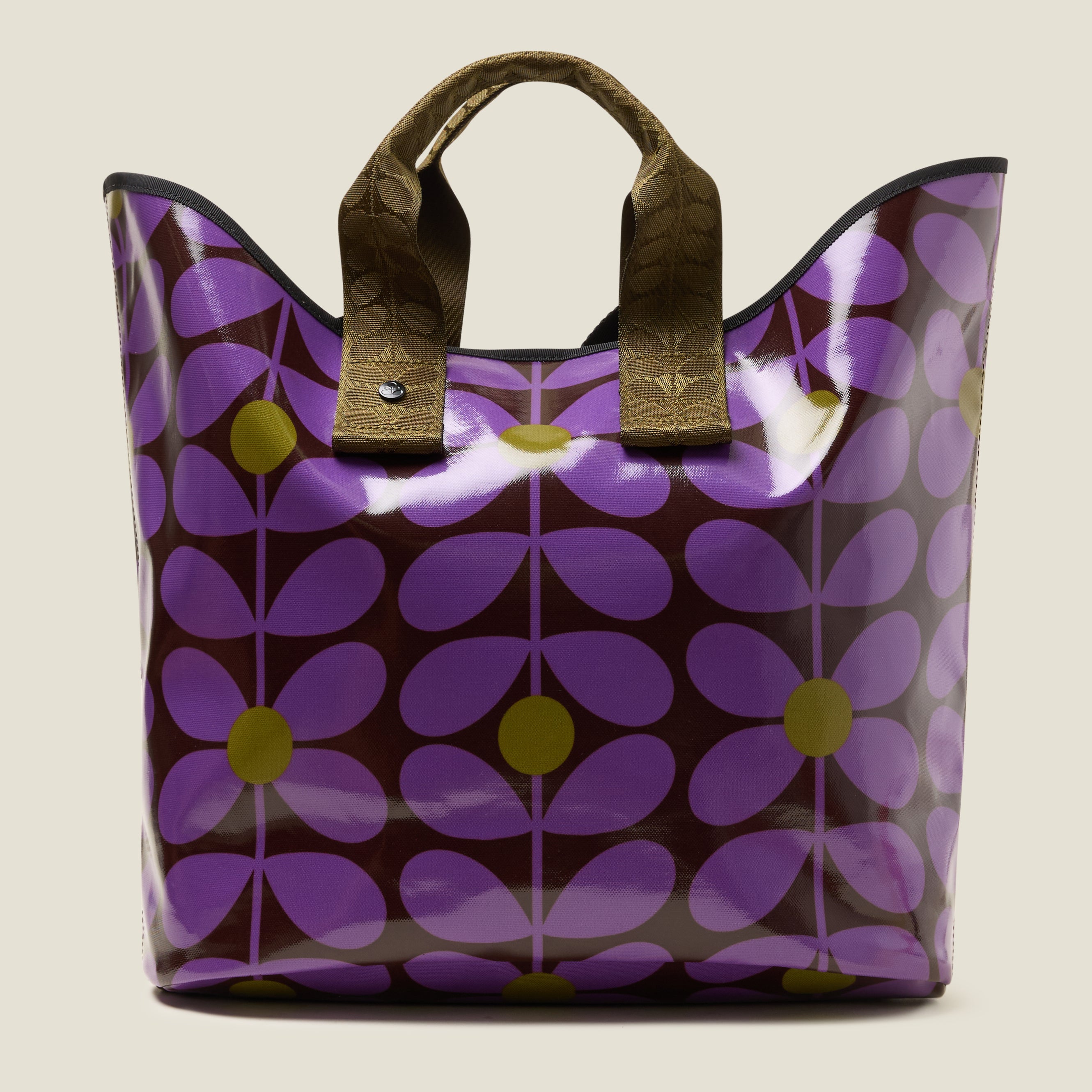Purple floral patterned tote bag with brown handles