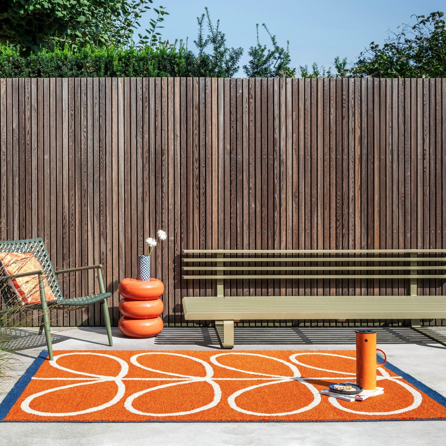 Linear Stem Outdoor Rug in Orange by Orla Kiely